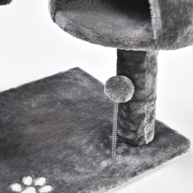 Rascador para gatos con jugetes